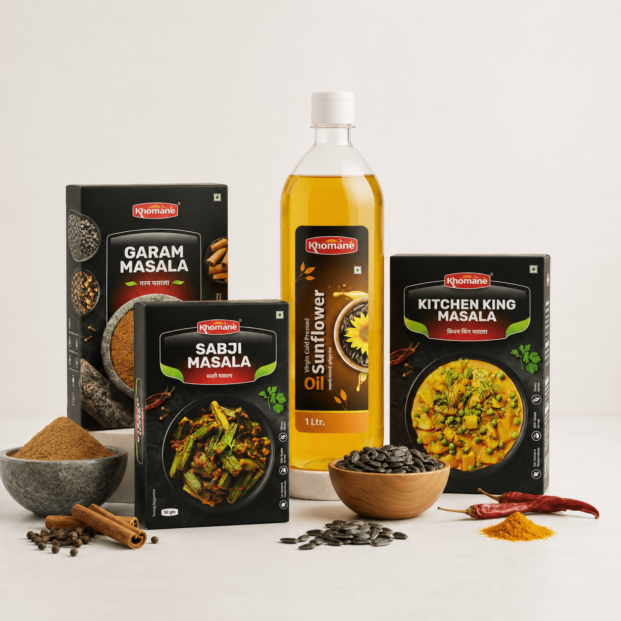 Khomanes Garam Masala, Sabji Masala, Kitchen King Masala, and sunflower oil bottle.